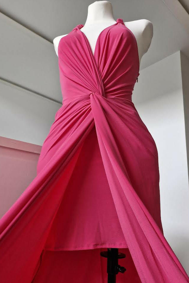 Long fuchsia dress with halter neckline and front slit