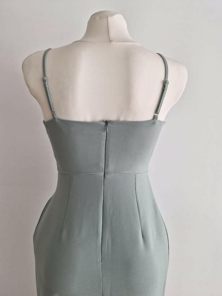 Elegant party dress with aqua green neckline