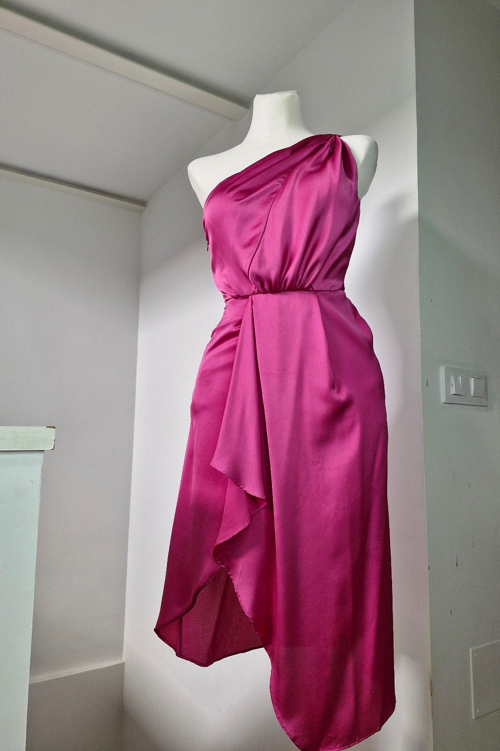 Asymmetrical fuchsia midi dress with ruffle