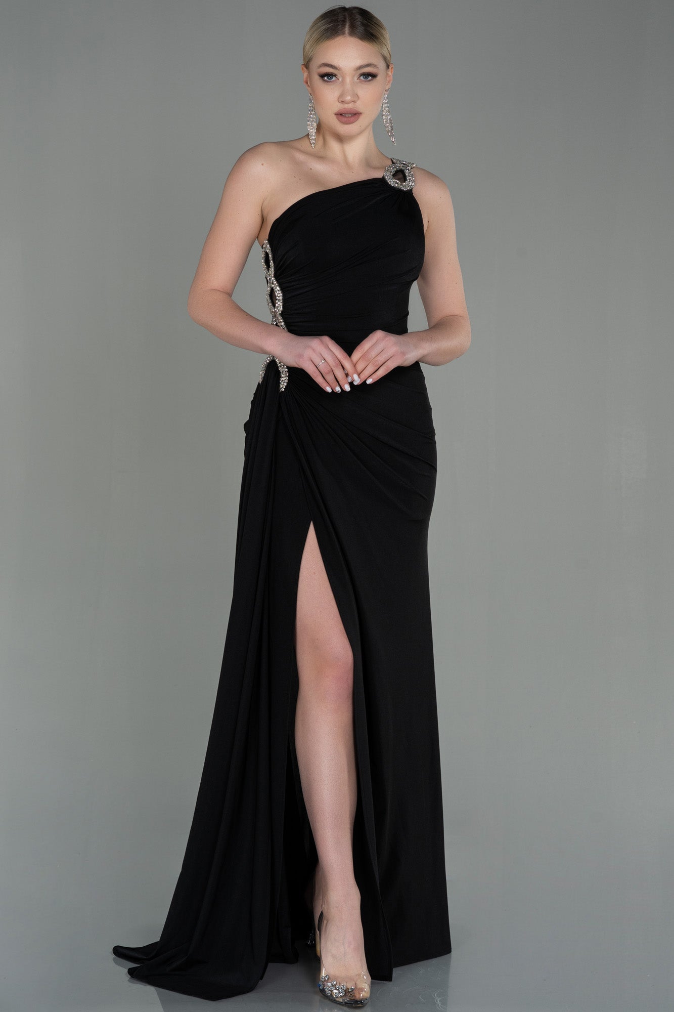 Long asymmetrical black party dress with silver detail