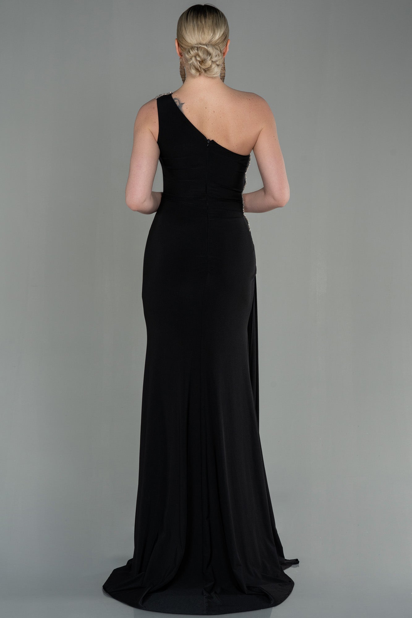 Long asymmetrical black party dress with silver detail