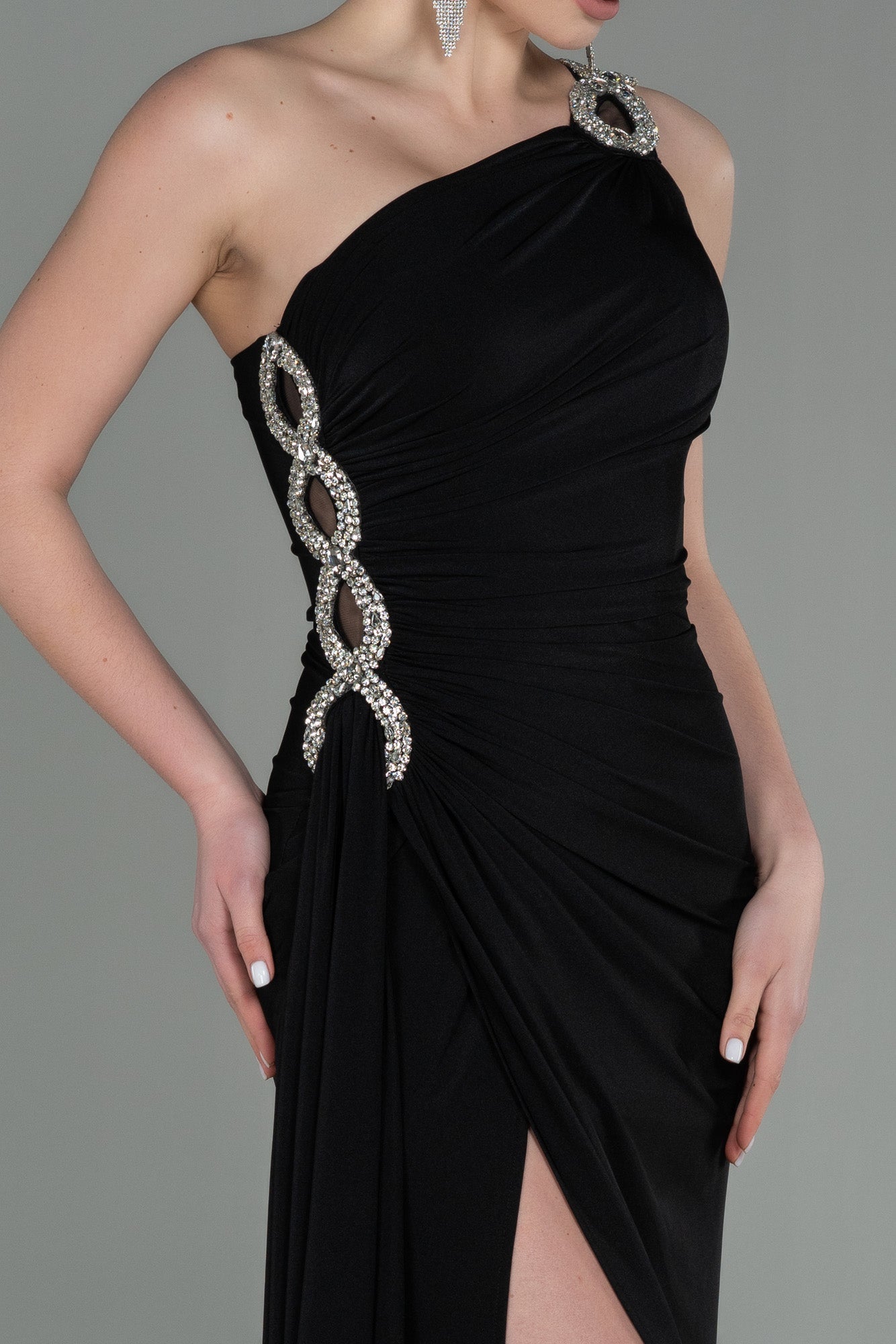 Long asymmetrical black party dress with silver detail