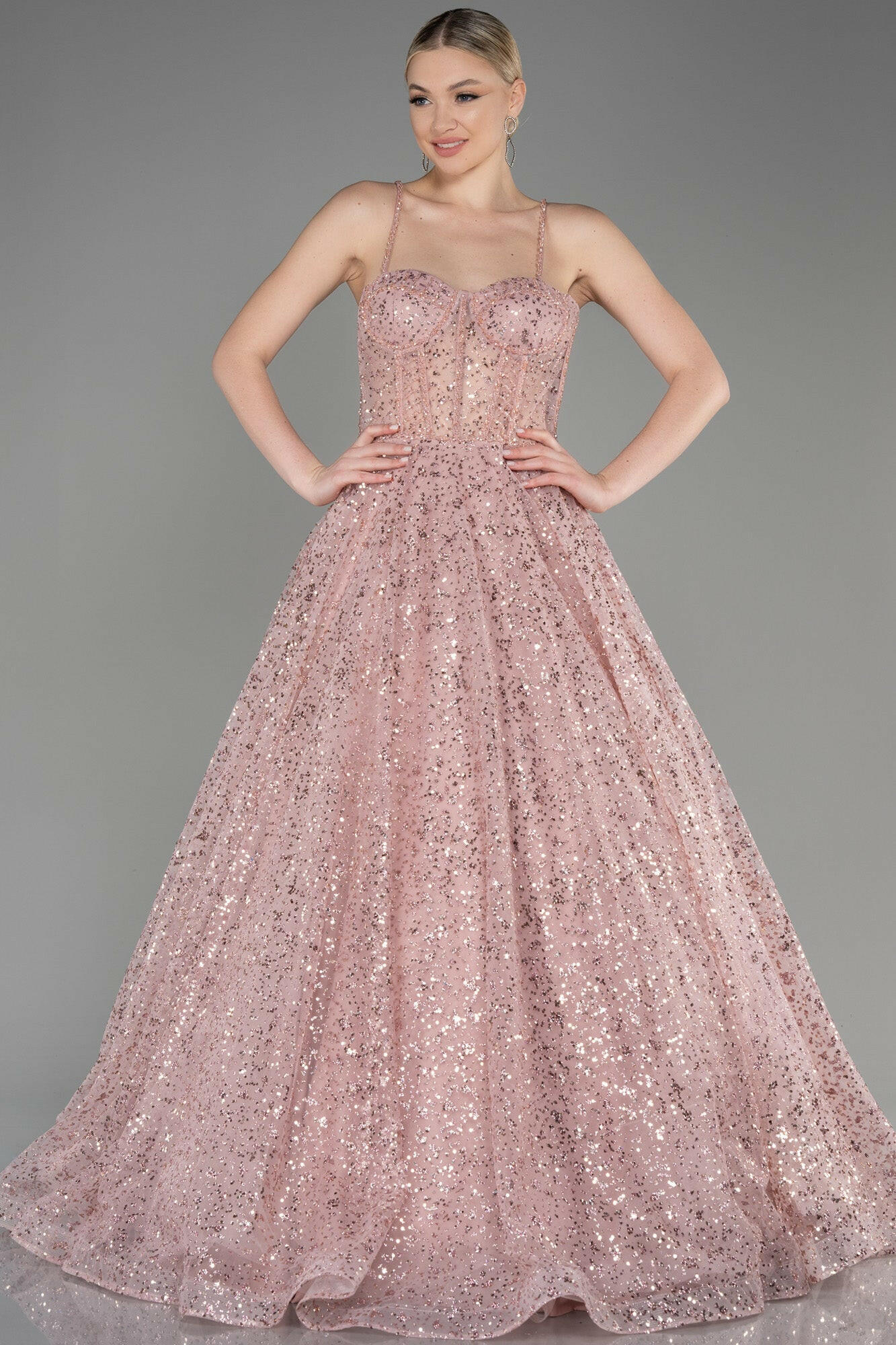 Pink princess-cut dress with corset and sequins