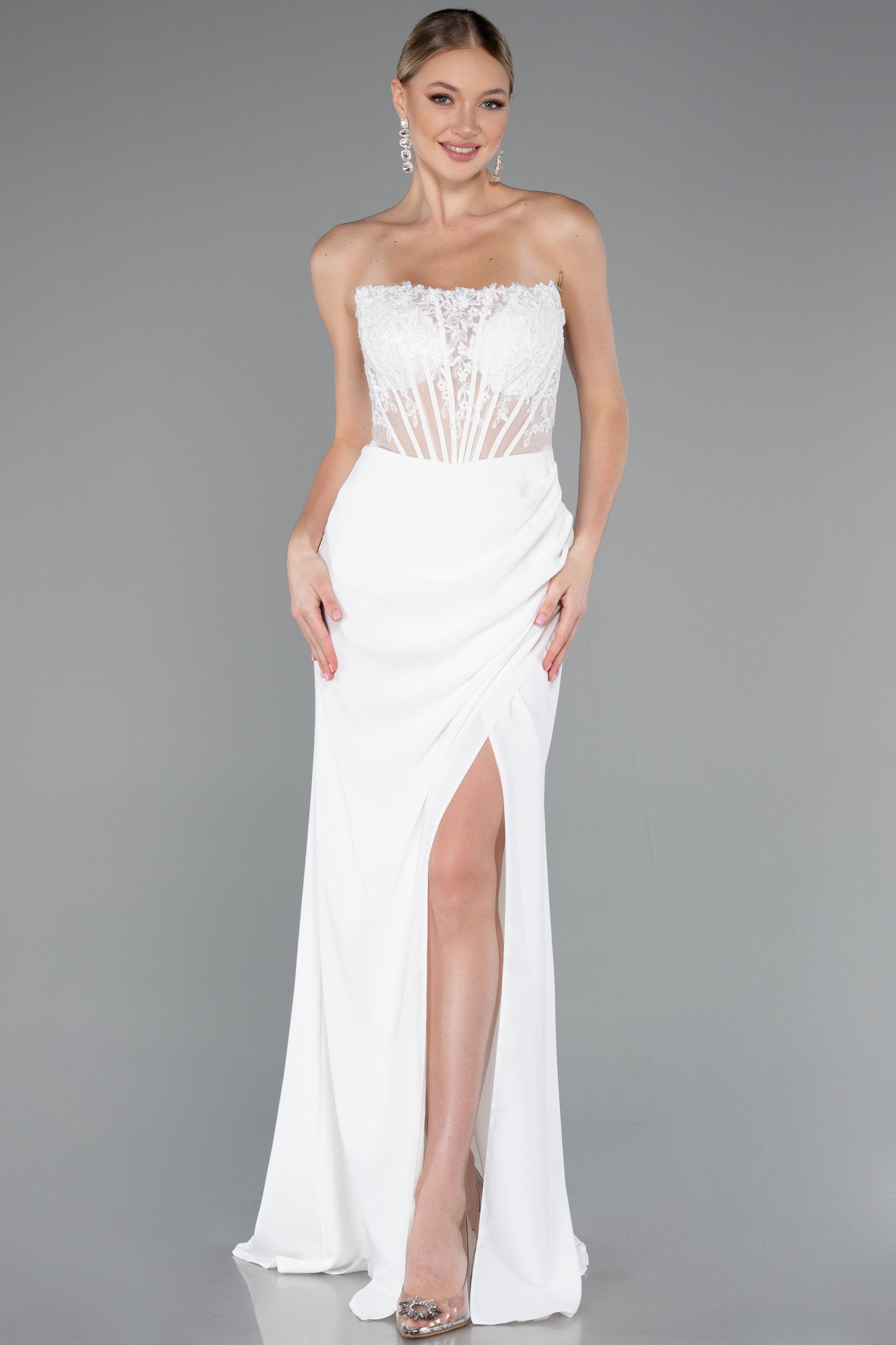 Strapless wedding dress with corset and slit