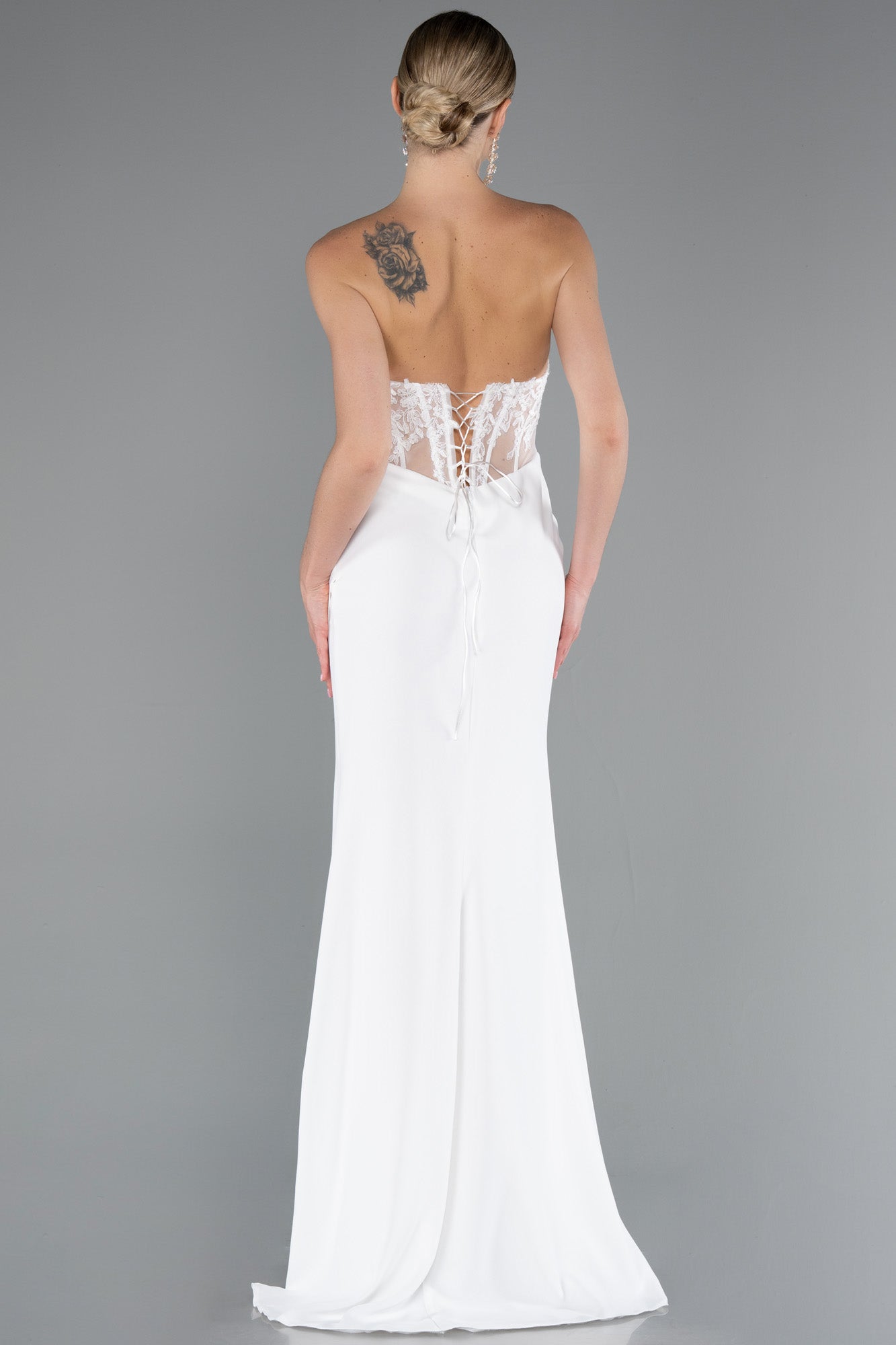 Strapless wedding dress with corset and slit
