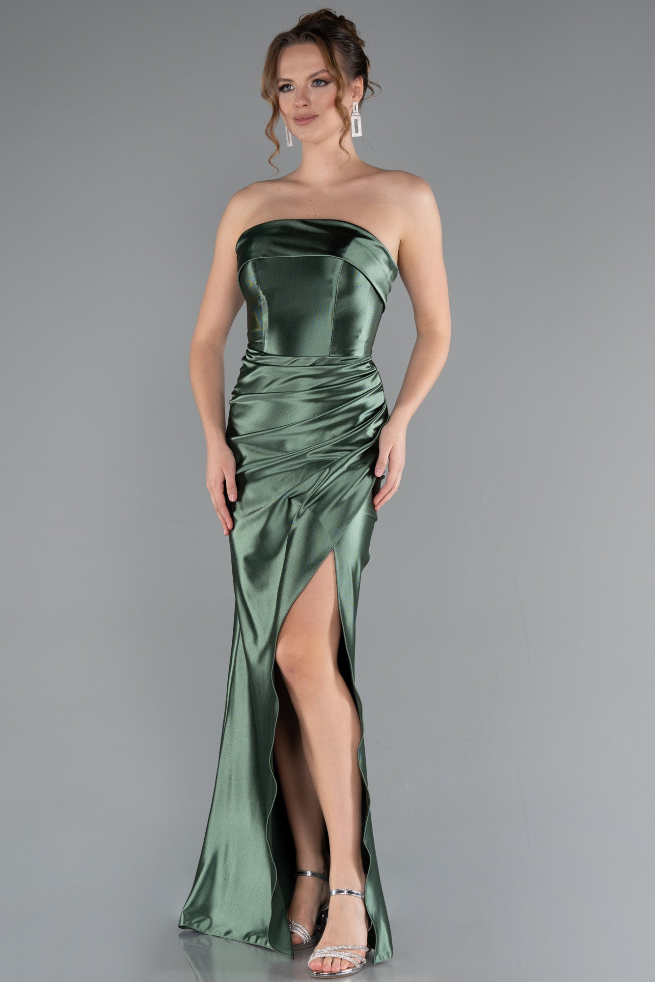 Long green satin dress with corset back slit