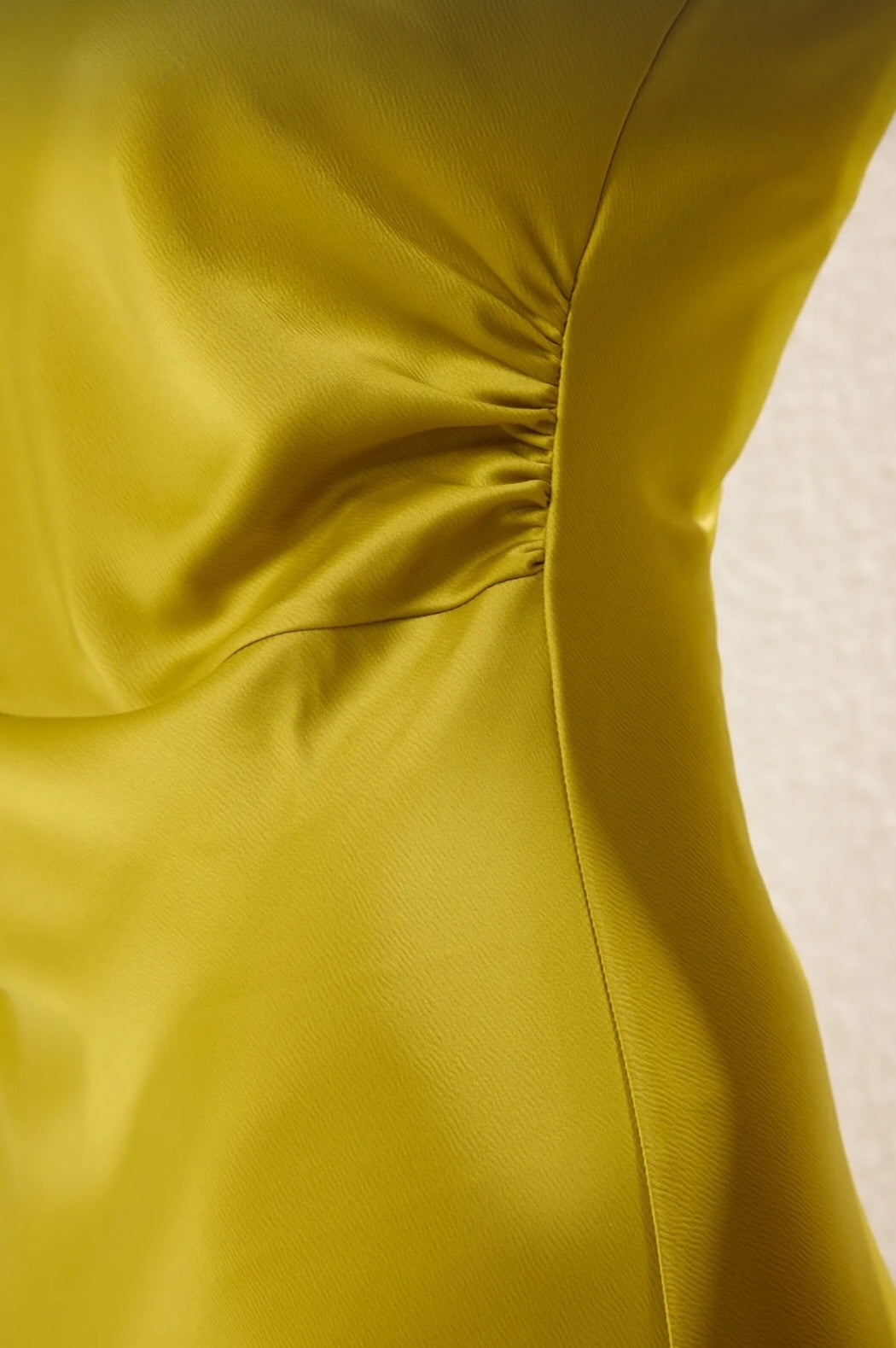 Lime-colored satin long dress with gathering