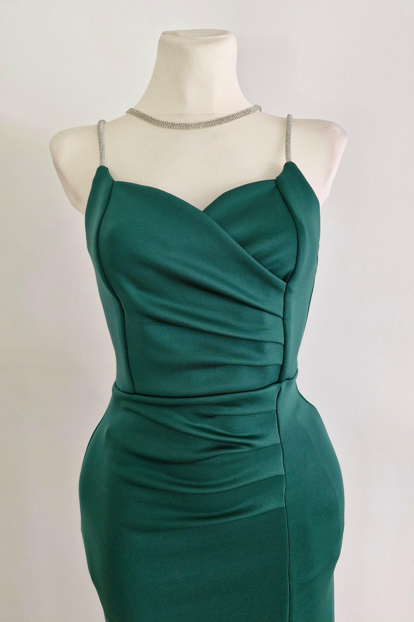 Long green party dress with silver straps
