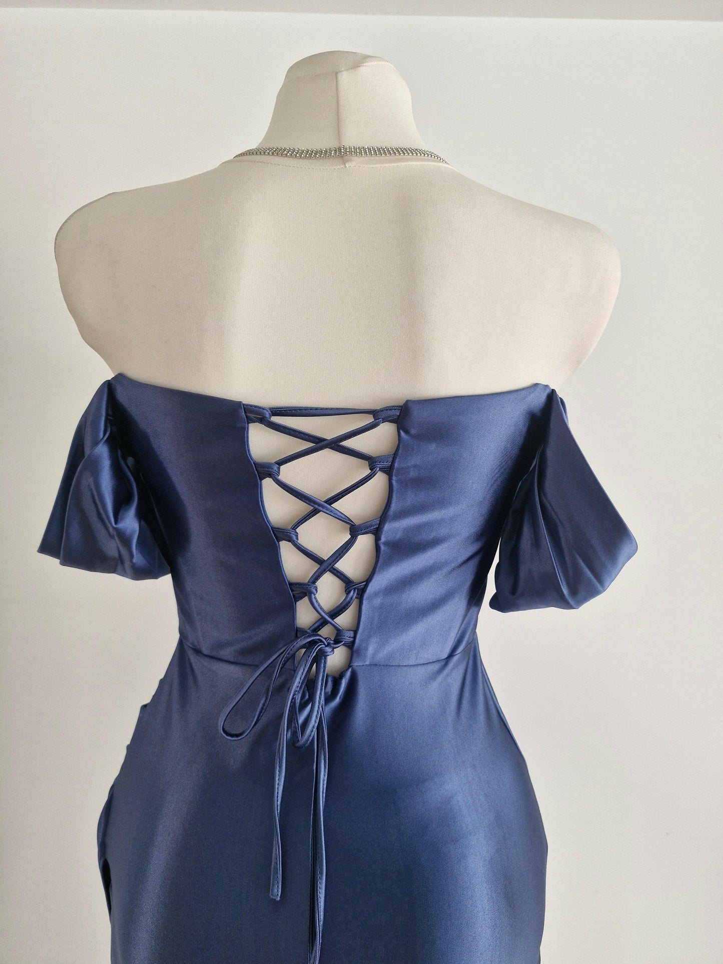 Long guest dress with corset and bardot neckline