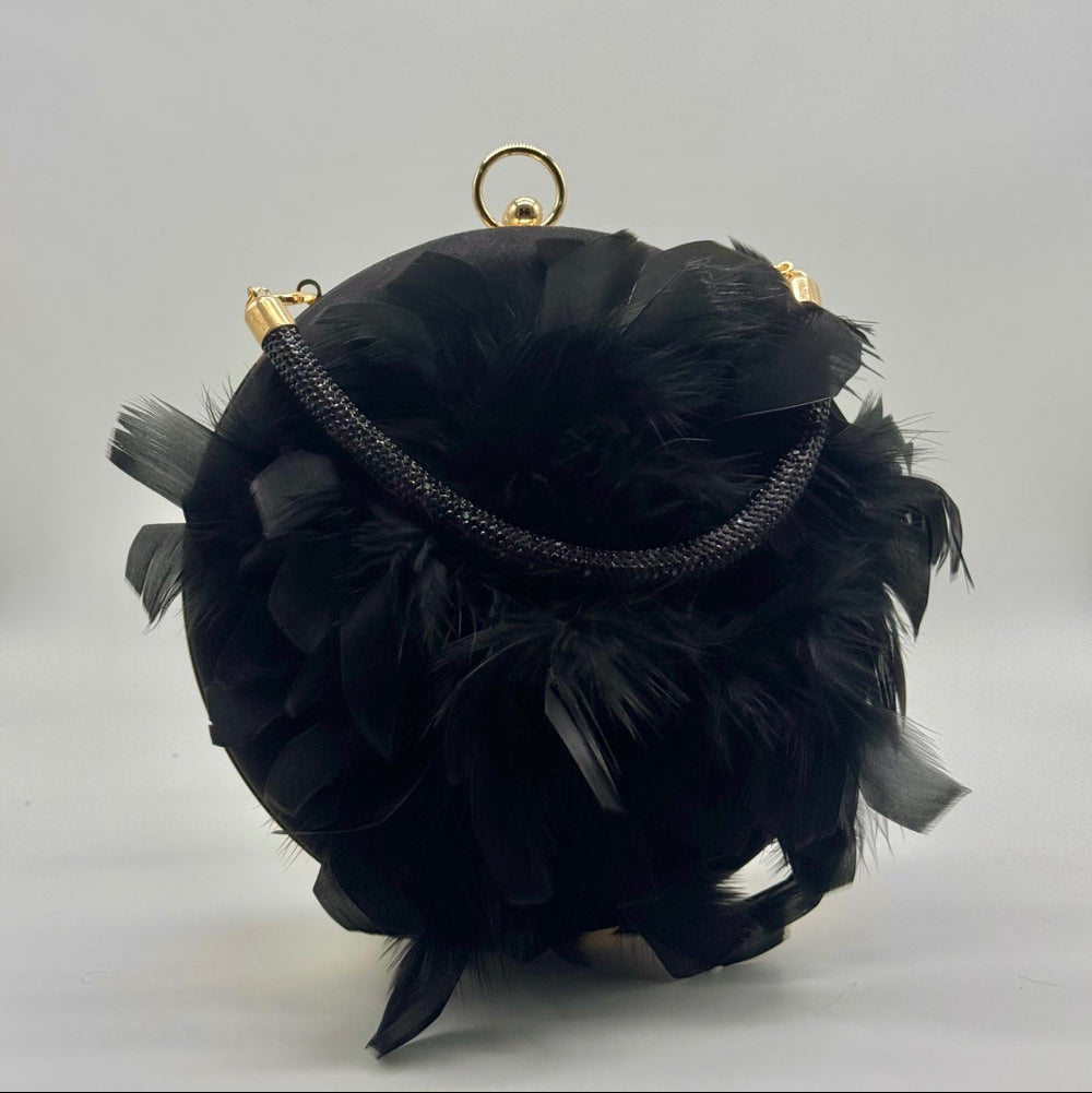Bolso clutch fiesta de plumas