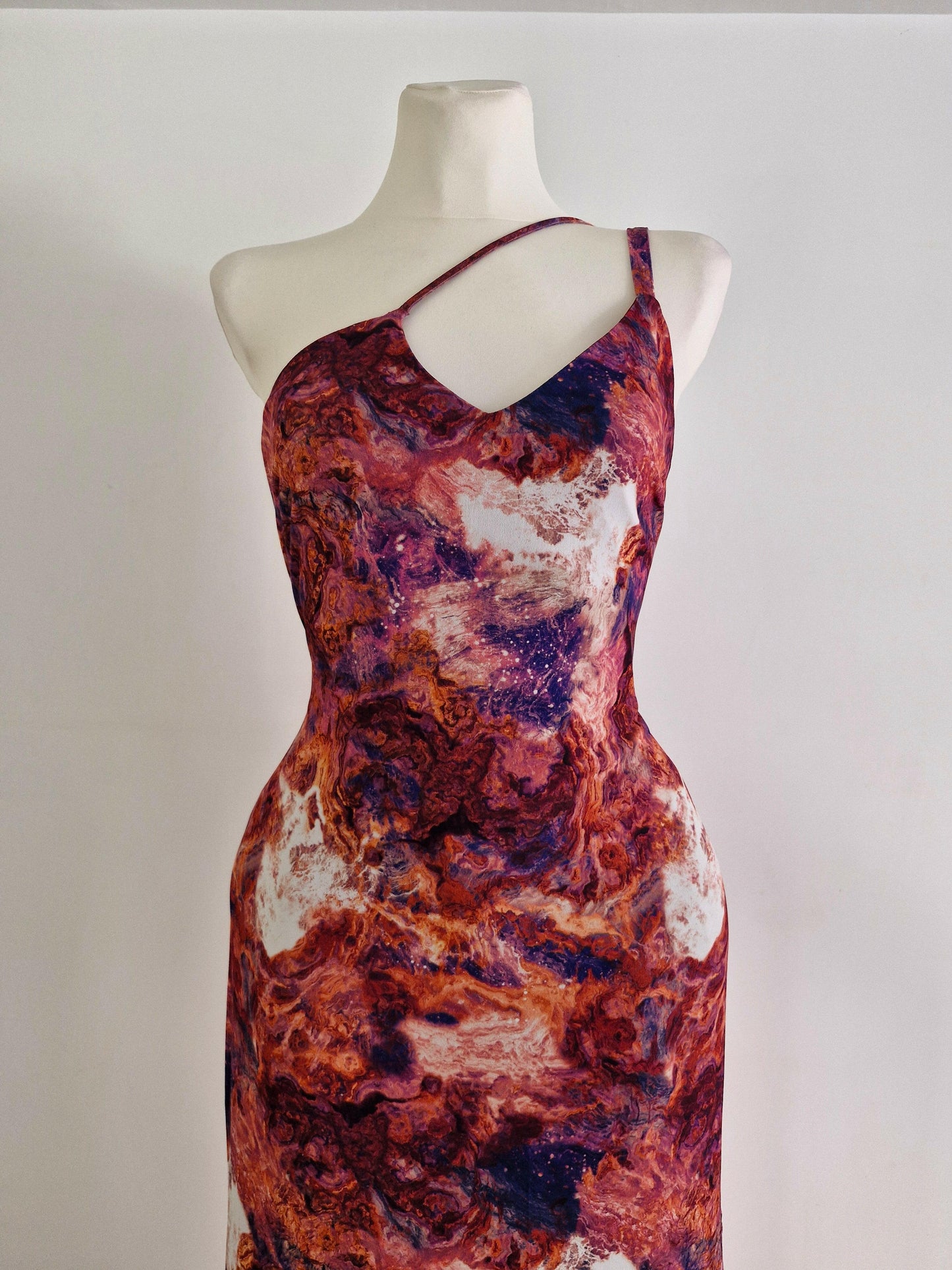 Long printed dress with asymmetrical neckline