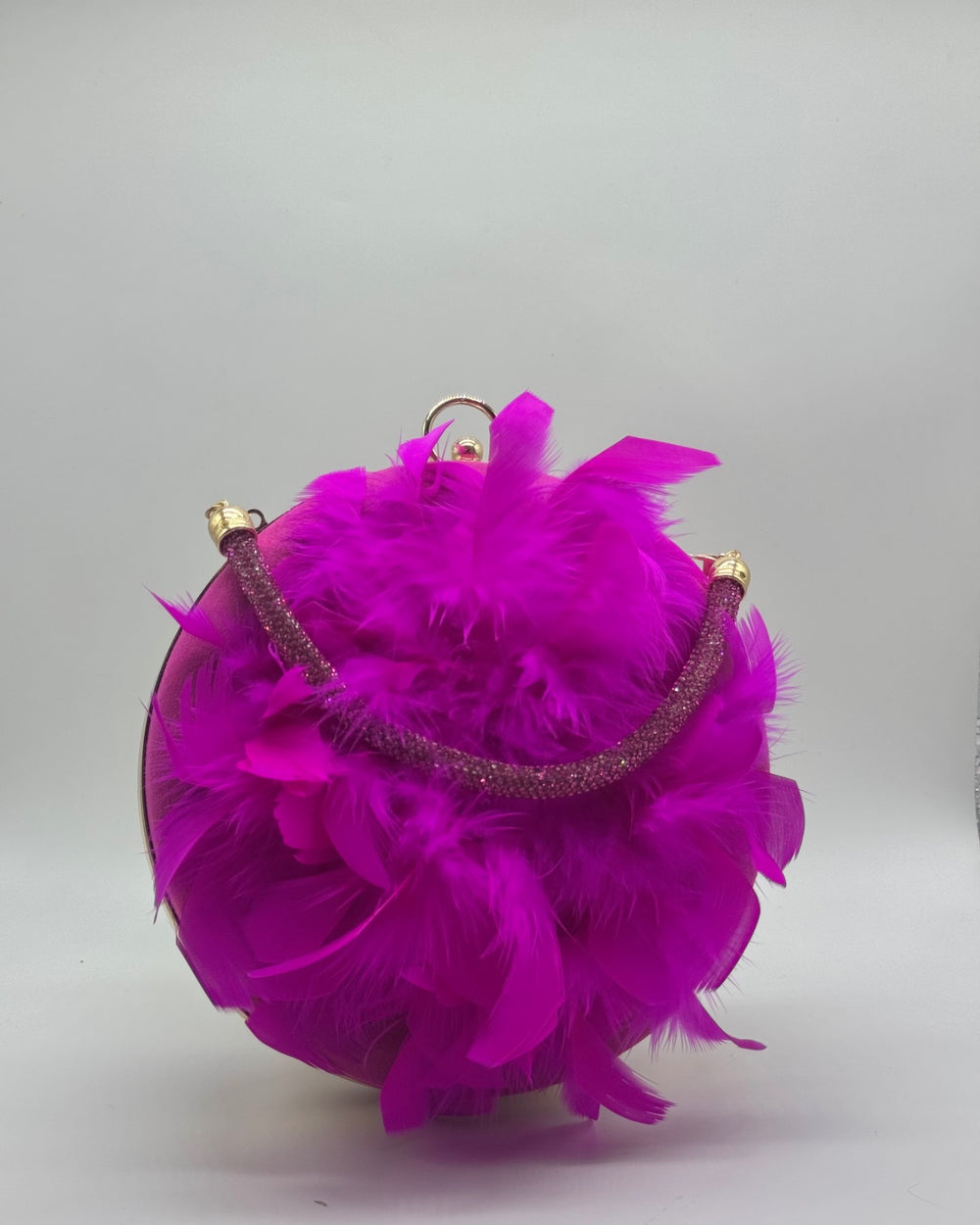 Bolso clutch fiesta de plumas