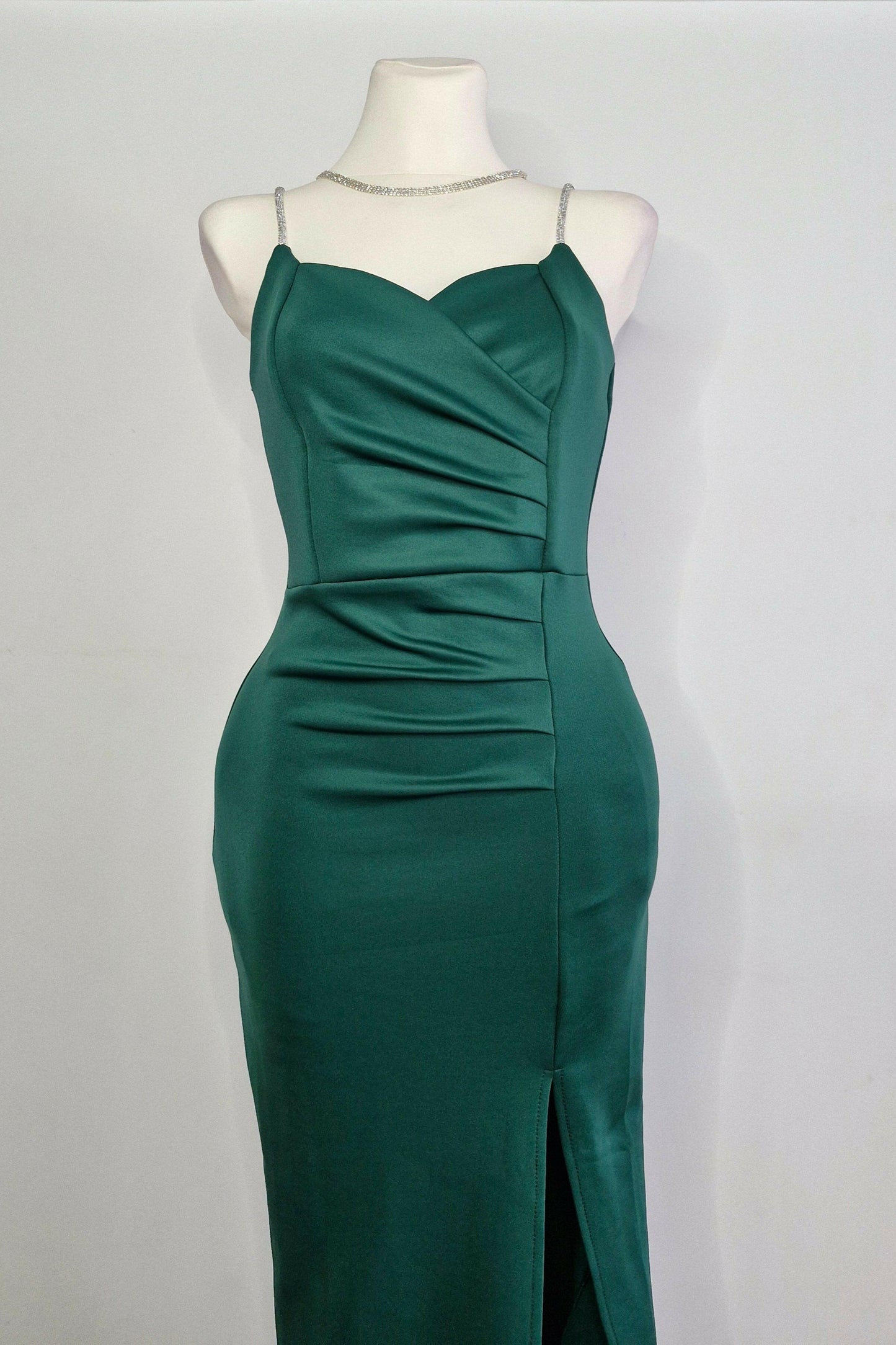 Long green party dress with silver straps