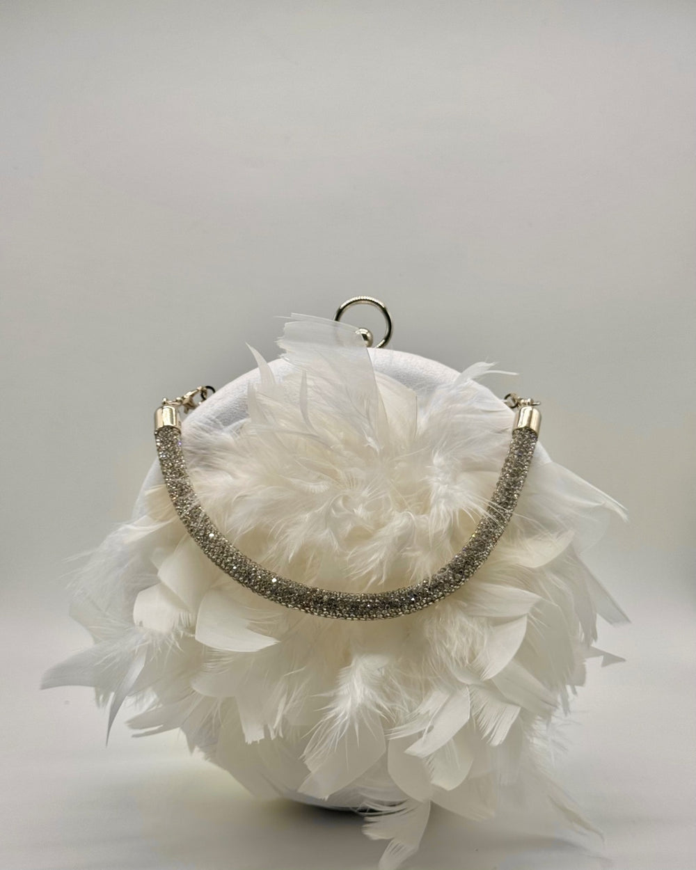 Bolso clutch fiesta de plumas