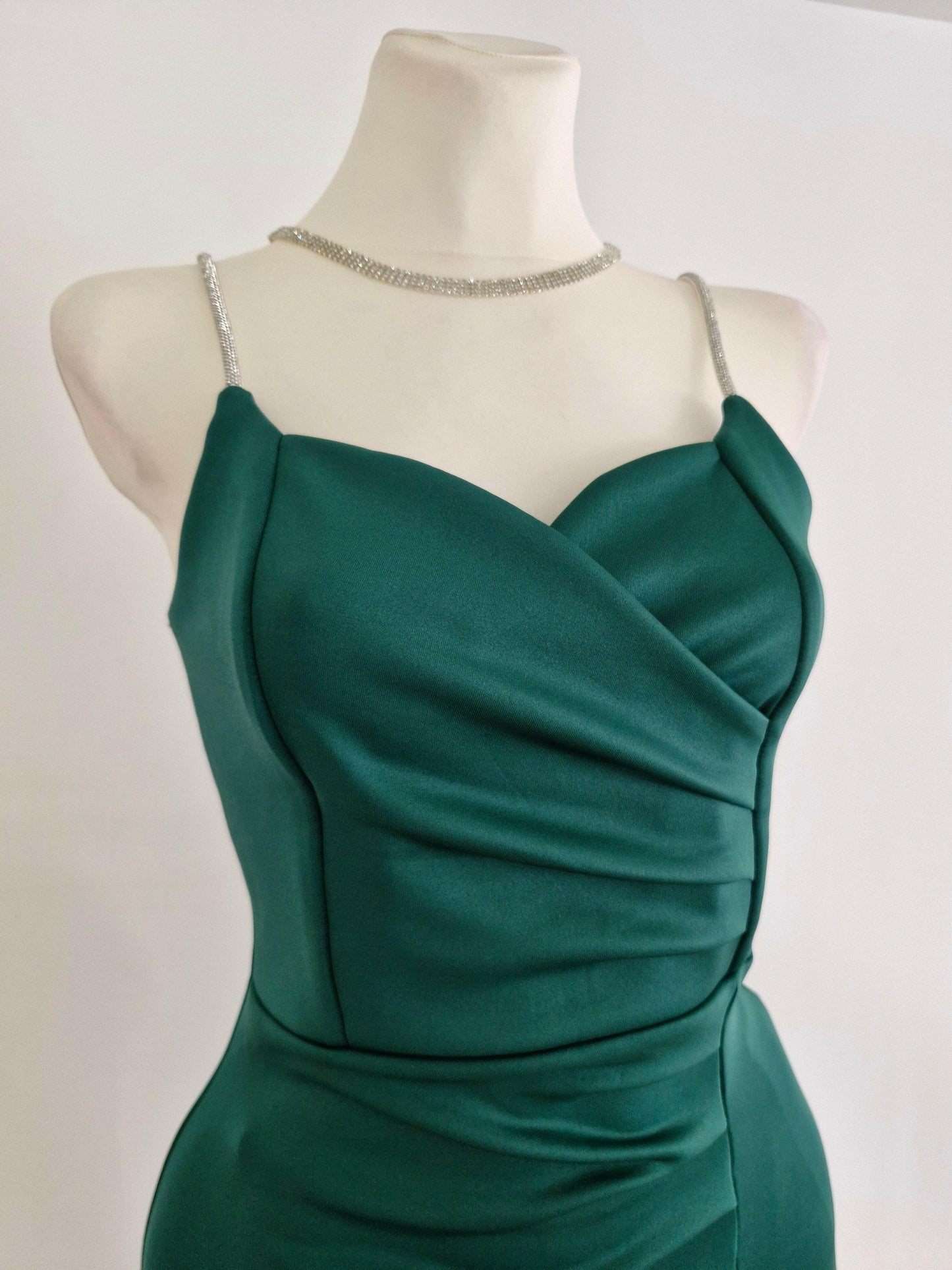 Long green party dress with silver straps